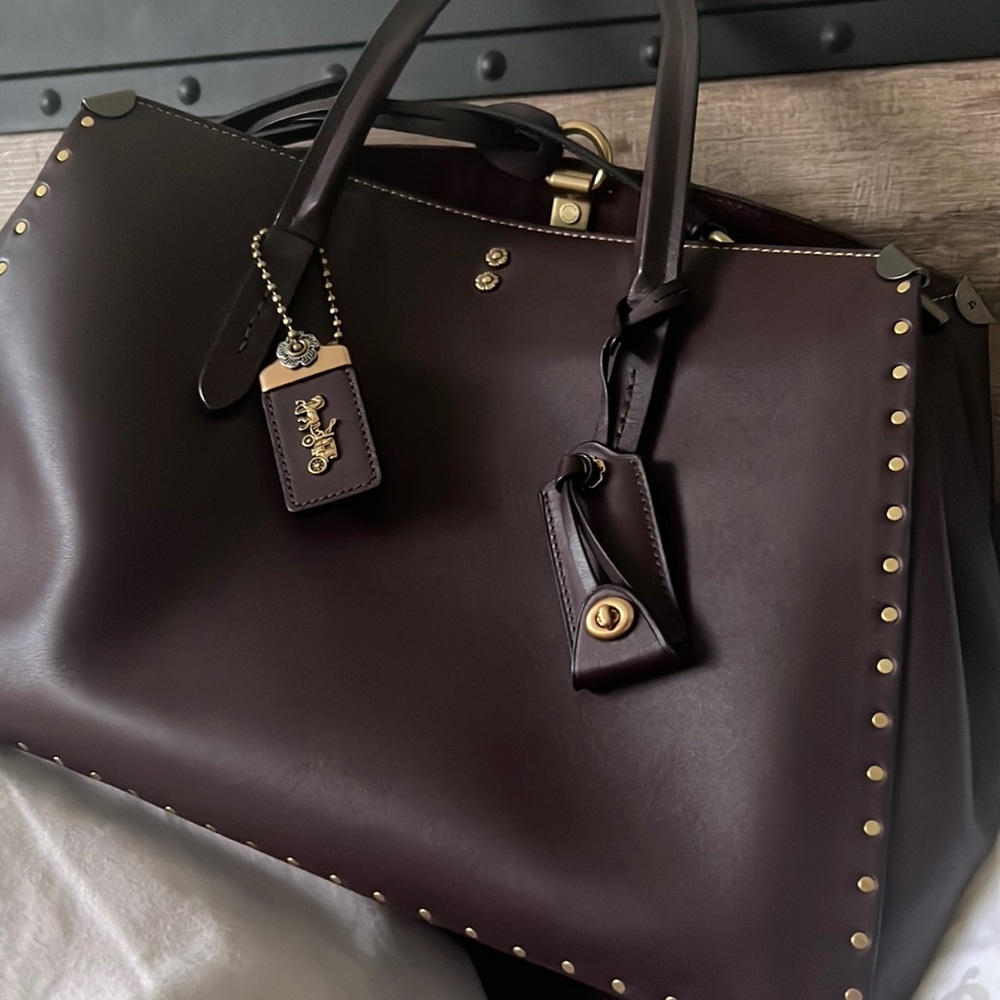 we are selling this coach handbag for one’s interested in designer.